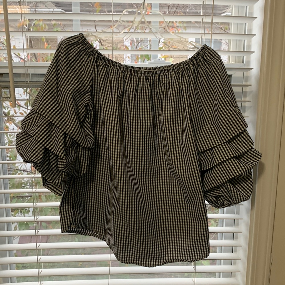 Black and white checkered blouse